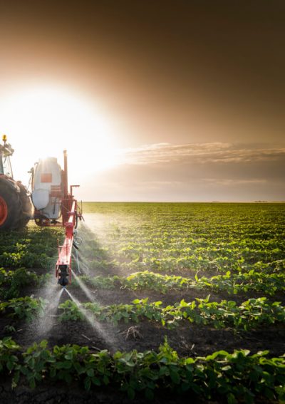 Tractor Spraying Pesticide on crops