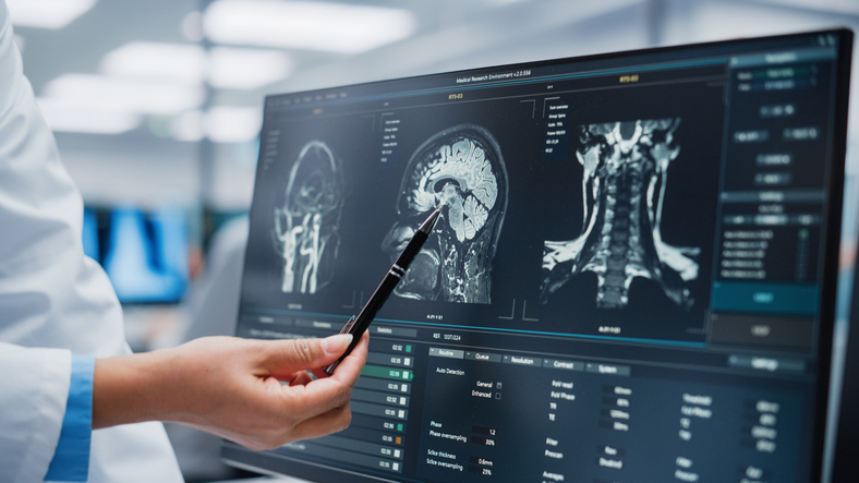 Medical Hospital: Neurologist and Neurosurgeon Talk, Use Computer, Analyse Patient MRI Scan, Diagnose Brain. Brain Surgery Health Clinic Lab: Two Professional Physicians Look at CT Scan. Close-up